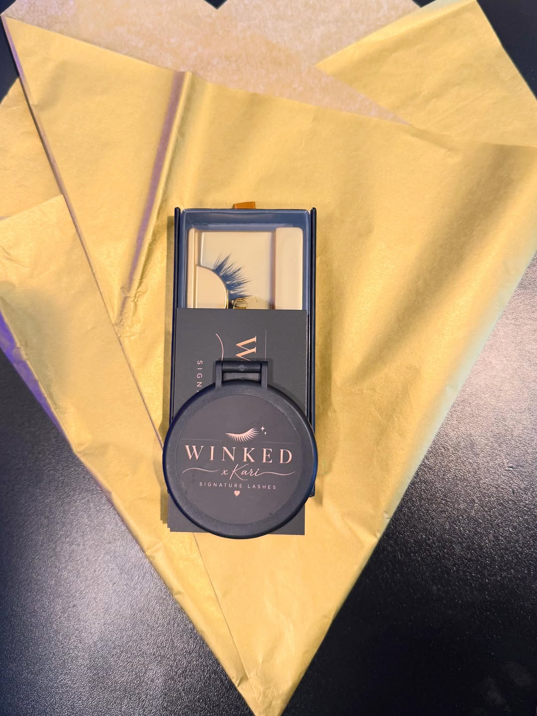 Winked x Kari orders carefully packed with thank-you cards and branded details
